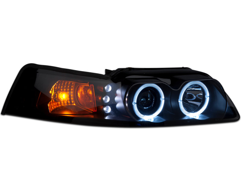 Raxiom 99-04 Ford Mustang Dual LED Halo Projector Headlights- Black Housing (Smoked Lens)