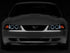 Raxiom 99-04 Ford Mustang Dual LED Halo Projector Headlights- Black Housing (Smoked Lens)