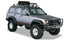 Bushwacker 84-01 Jeep Cherokee Cutout Style Flares 4pc Fits 4-Door Sport Utility Only - Black